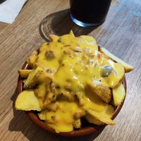 Bacon cheesy fries at Cerveceria La Raposa in Oviedo
