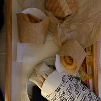 Onion rings, fries, wrap and hamburger at Cerveceria La Raposa in Oviedo