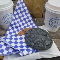Oatmilk latte and Matcha w/ oatmilk. (Non vegan cookies) at Haven Cafe in Covington