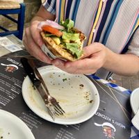 Vegan pitta - a vegan veggie type patty with salad and chips  at Mom's Kitchen in Kos