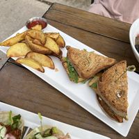 Breakfast sandwich with wedges  at Lettuce Love Cafe in Burlington