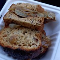 Mushroom Sausage Tastie with onions and brown sause at The Vegan Street Food Company in Worthing