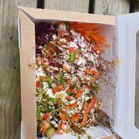 Vine leaves and salad box at The Chic Pea in Falmouth