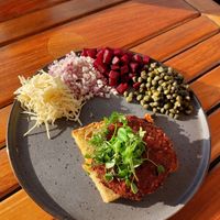 Vegan steak tartar on fried bread, with horseradish, red onion, pickled beetroot, and capers.  at Lilleheden in Hirtshals