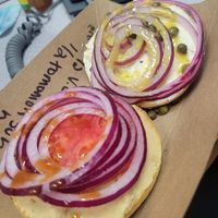 Half Vegan Caper and Half Vegan TomOnion. Hummus base and local Tofu Spread base 🤤🤤🤤 at Los Bagels in Arcata