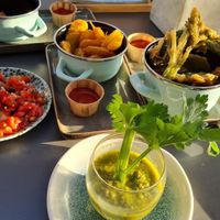 Bruschetta, green gazpacho, tempura greens and some fried potatoes with a spicy sauce at Boulevard 17 in Vlissingen