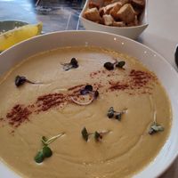 Creamy lentil soup with home-made croutons at Nom Nom in Constanta