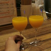 Mango Mimosas at Champagne & Gyoza Bar in Osaka