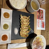Set truffle gyoza, with vinegar salad and onion soup  at Champagne & Gyoza Bar in Osaka
