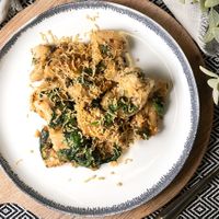 Cashew-Ricotta Ravioli with Garlic Cashew Cream & Spinach Sauce  at Eat Plants in Toronto