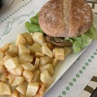 Quinoa & kale burguer w/ homemade potatoes   at Ancora in A Coruna