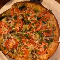 Cauliflower crust (only available in 12”) with veggies and vegan cheese at Peddlers Pizza Pub in Valparaiso