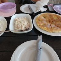 Coleslaw, tzatziki (vegetarian) and garlic bread at Pizza Amici in Thasos
