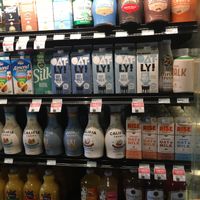 Plant milks at Natures Green Grocer Market in Peterborough