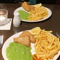 Vegan ‘fish’, chips and mushy peas. Piping hot and very tasty.  at Mod's Vegan Cafe at the Thirsty Scholar in Manchester