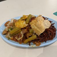 Simple and delicious fried noodles with bitter gourd and curry cabbage. at Gong Fu Yuan 共福缘素食 in North Singapore
