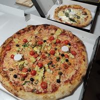 La Franca XL (Vegan) and vegetarian cheese pizza in background at Fat Toni's Pizzeria in Stroud