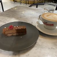 Chocolate cake snd latte at Kafé Plattan in Stockholm