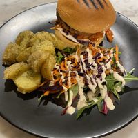 Kimchi burger with green and potato salad  at Kafé Plattan in Stockholm