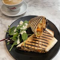 Buffalo cauliflower wrap and cappuccino   at Kafé Plattan in Stockholm