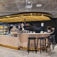 I side at Kafé Plattan in Stockholm