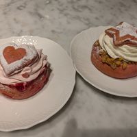 Strawberry semla on the left, traditional semla on the right at Kafé Plattan in Stockholm