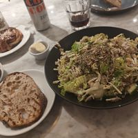 Caesar salad with bread at Kafé Plattan in Stockholm