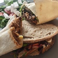 Two different wraps and one sandwich. Philly cheese, teriyaki and bahn mi. All delicious! at Kafé Plattan in Stockholm