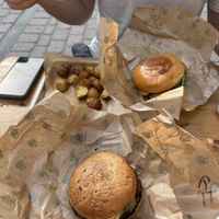 Cheeseburgers (the one in the front with GF bun) plus potatoes  at Plant Food in Aarhus