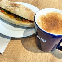 Hummus sandwich and chai latte at Wayne's Coffee in Berlin