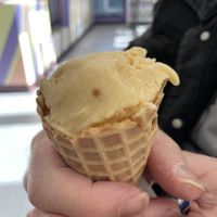 Coconut based creamsicle in a waffle cone at Like No Udder in Providence