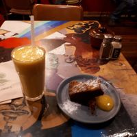 Mango turmeric smoothie and date-cashew slice at Revel! in Auckland