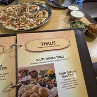 We shared this!! So filling and tasty! Uttapam is like a crepe or pizza with the base of rice  at Sagar Ratna - Connaught Place in New Delhi