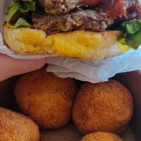 Seitan chickn burger and mac n cheese balls at The Forest in Oroklini