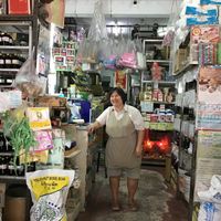 Happy shop keeper. at Whole Sale Shop in Ubun Rachatani