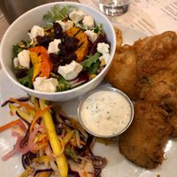 Celeriac “fish” with mango slaw and house salad at MILA in Vancouver