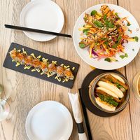 Mila Roll, bao buns, and mango satay slaw, as well as the virgin mojito and the cider on tap   at MILA in Vancouver