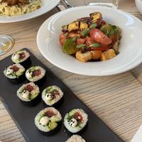 Sushi (good but too expensive), panzanella salad   at MILA in Vancouver