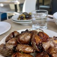 Smashed potatoes   at MILA in Vancouver