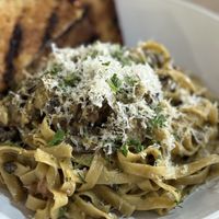 MUSHROOM + SAUSAGE TAGLIATELLE  at MILA in Vancouver