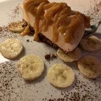 Vegan cheesecake with bananas and caramel sauce   at Ciro and Sons in Florence