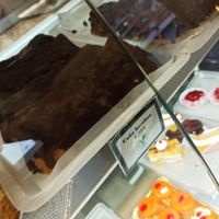 Cañas de hojaldre y chocolate bañadas at Panadería Confitería Inma in Malaga