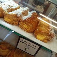 Cañas de coco con crema pastelera at Panadería Confitería Inma in Malaga