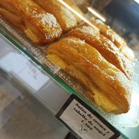 Suizo de crema y cabello de 👼 at Panadería Confitería Inma in Malaga