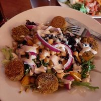 Falafel salad. That's tahini on top. at Gun Flint Tavern in Grand Marais