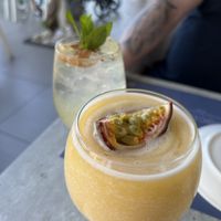 Mango spritz (mocktail) in the background and Passionfruit daiquiri in foreground   at Hippocampus in Protaras