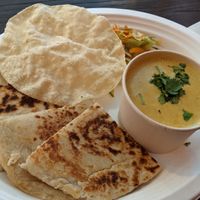 Coconut Kaju curry with naan bread  at Twin Flames in Ellenbrook