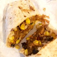 Jackfruit Burrito: spicy jackfuit, brown rice, black beans, sweetcorn, house made guacamole, house made pico de gallo salsa, vegan cheddar cheese. Fantastic! at Bites7060 in Larnaca