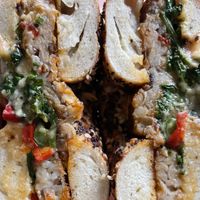 “Philly style” tempeh, broccoli rabe, and creamy cauliflower toum on everything bagel at Everything Bagels in Durham