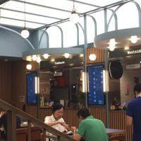 Inside BaseHall - various stalls sharing seating  at Treehouse in Hong Kong Island